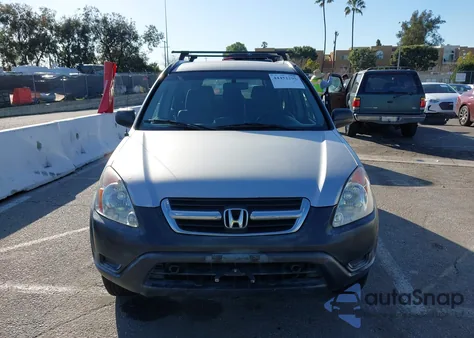 2004 Honda Cr-V Lx z USA, uszkodzony, nr VIN JHLRD68464C012103